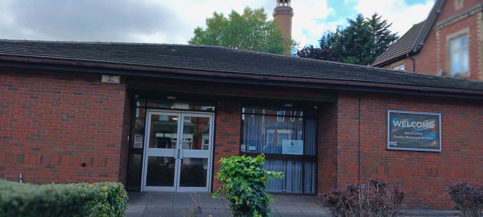 Aspire 2 in Smethwick: a single-storey red brick building with a covered entrance